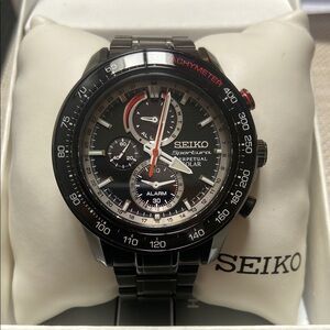 SEIKO Sportura Black and Silver Solar Watch
